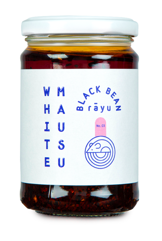 clear jar with white lid and label containing white mausu black bean rāyu
