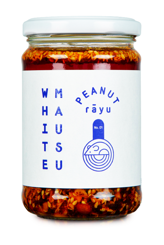 clear glass jar with white lid and label, containing White Mausu Peanut Rāyu
