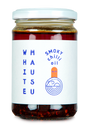 clear jar with white lid and label containing white mausu smoky chilli oil